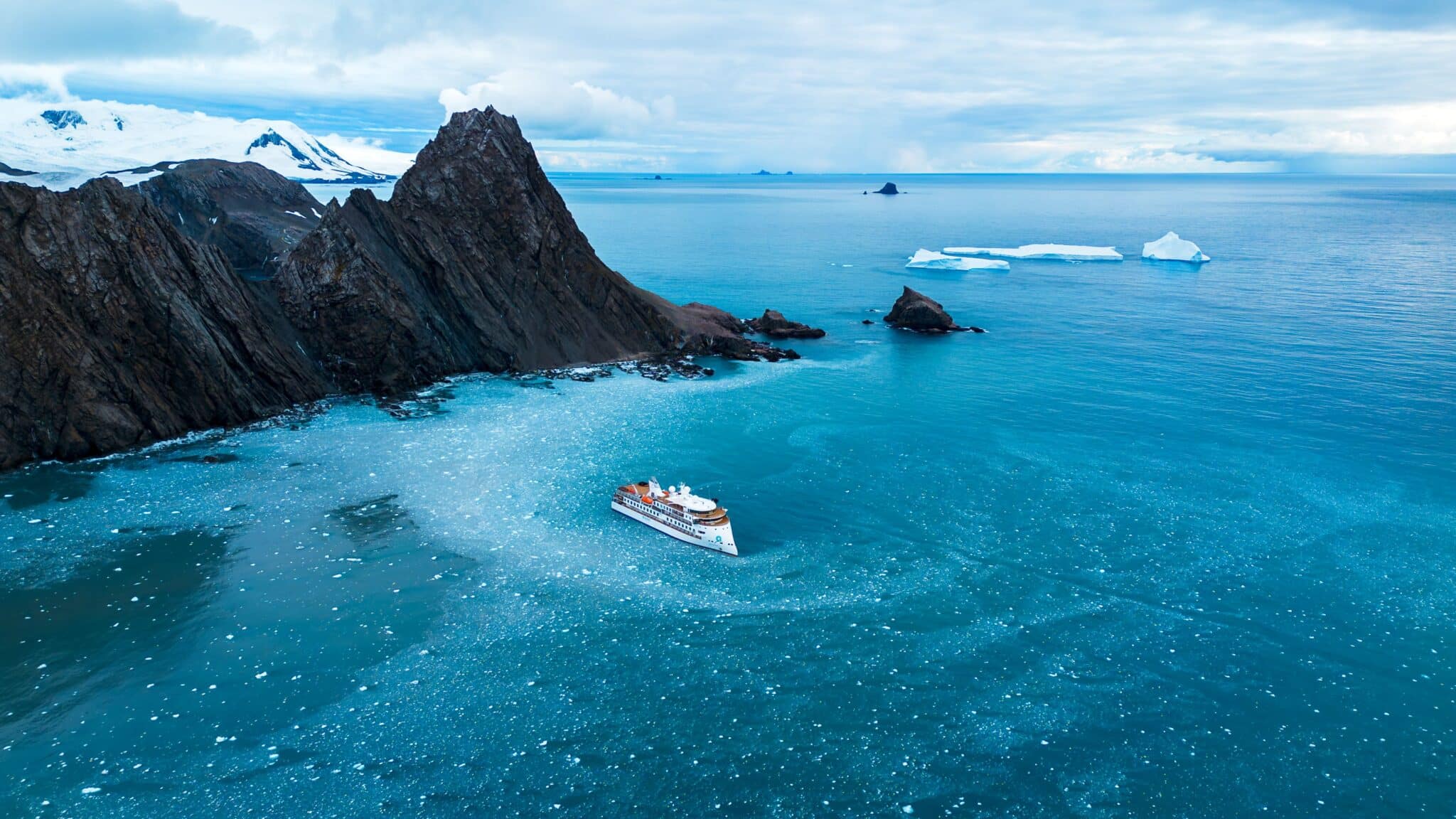 The Greg Mortimer cruising near Elephant Island, Antarctica